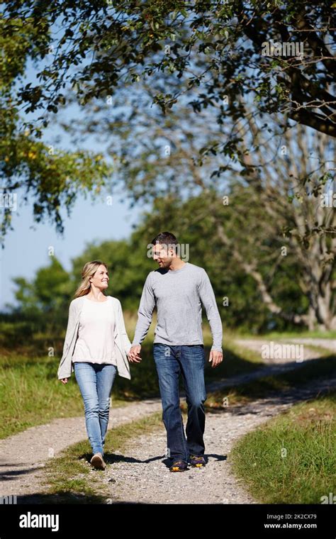 Its A Perfect Day For Love Full Length Shot Of A Young Couple Walking