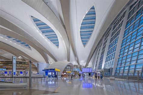 Kpf Completes Abu Dhabi Airport Inspired By Undulating Sand Dunes News Archinect