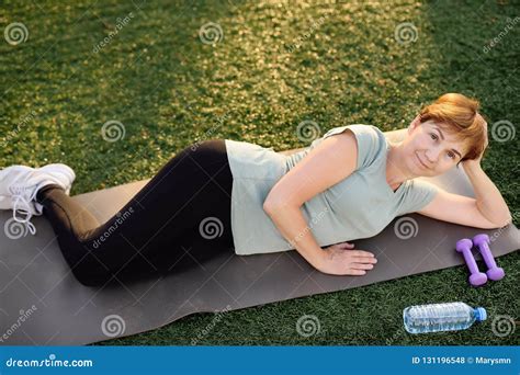 Mature Woman Doing Fitness Exercise With Dumbbells Stock Photo Image