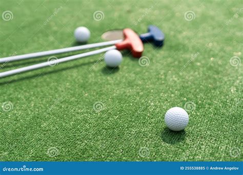 Close Up Of Miniature Golf Hole With Bat And Ball Stock Image Image