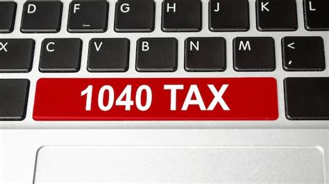 Premium Photo 1040 Tax Words On Red Keyboard Button Tax Concept