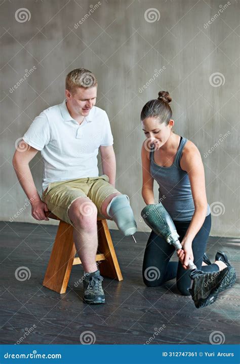 Physiotherapist Rehabilitation And Prosthetic Leg In Clinic For Support Physiotherapy And