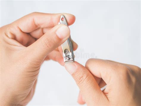 Closeup Of A Woman Cutting Nails Stock Image Image Of Isolated