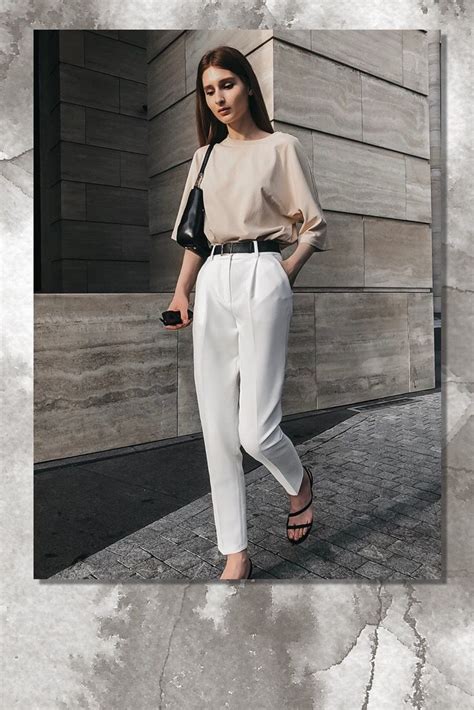 White Elegant Trousers And A Beige T Shirt Create A Pleasant Charming