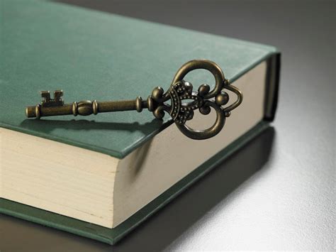 premium photo close   key  book  table