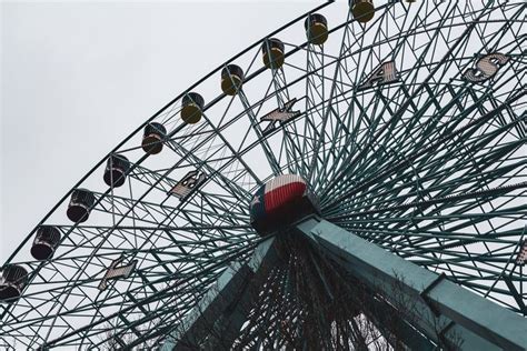 The Texas Star Ferris wheel rises into the overcast sky over Dallas ...