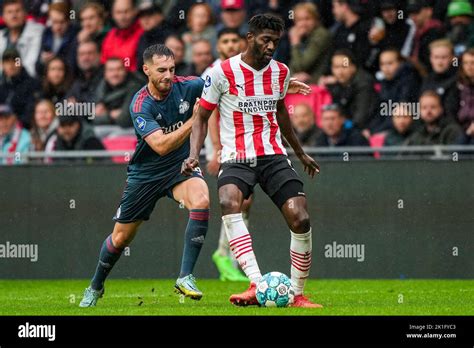 Eindhoven - Orkun Kokcu of Feyenoord, Ibrahim Sangare of PSV Eindhoven ...