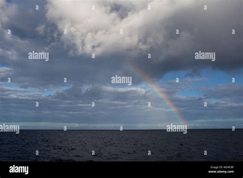 Atmospheric refraction of light through storm clouds sunlight hi-res ...