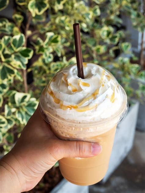 Cappuccino Blended In Plastic Cup Served With Whipped Cream