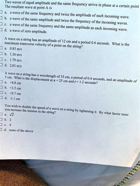 Solved Two Waves Of Equal Amplitude And The Same The Frequency Arrive