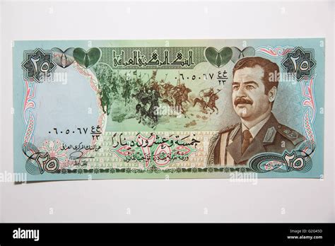 The Front Of The Iraq Dinars Note Featuring Saddam Hussein Stock