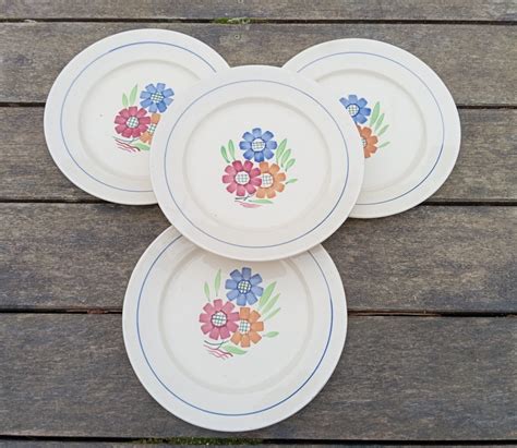 4 assiettes plates décor floral modèle Agnès de K G Lunéville 1910 20