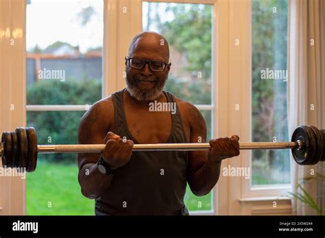 Senior Man Lifting Barbell Stock Photo Alamy