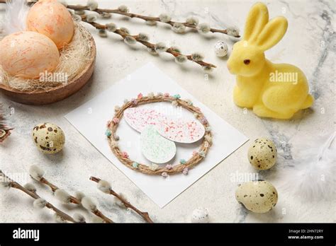 Beautiful Easter Composition With Greeting Card Eggs Bunny And Pussy
