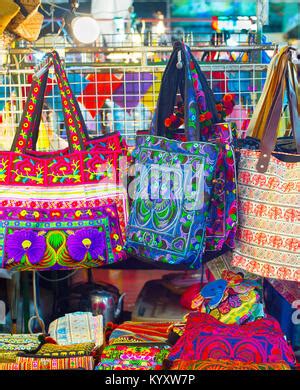 Bags and souvenirs for sell at night market. Chiang Mai, Thailand Stock ...