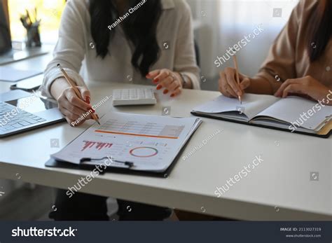 cropped view workers working  document stock photo