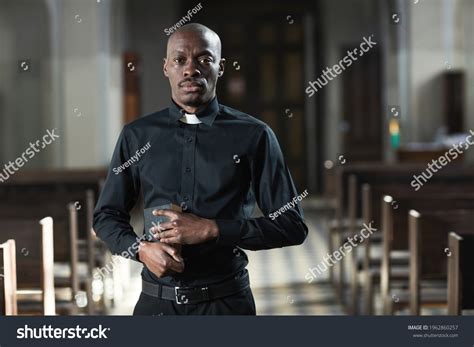 Portrait African Priest Black Suit Holding Stock Photo 1962860257 | Shutterstock