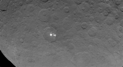 Dwarf Planet Ceres Bright Spots Shrink But Stay Strange On Approach Cnet