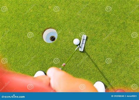 Golf Player Putting Ball In Hole Stock Photo Image Of Cropped Golf