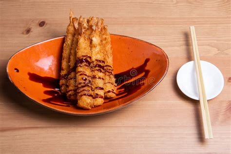 Tempura Deep Fried Shrimp Ebi With Sweet Chili And Soy Sauce On Black