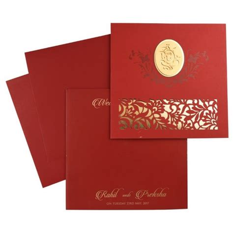 Ganesha Theme Hindu Wedding Card In Red With Laser Cut Floral Patterns