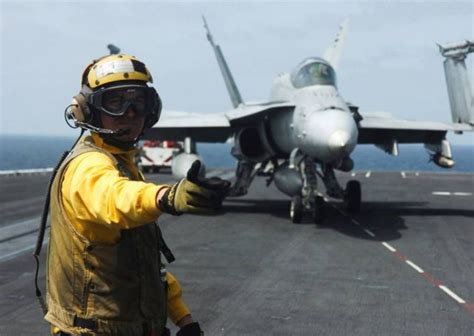 What the color-coded uniforms of US Aircraft Carrier Crews mean | WordlessTech