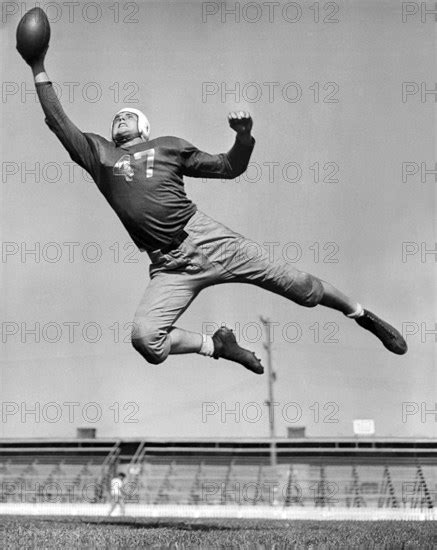 Football Player Catching Pass Photo12 Underwood Archives UIG