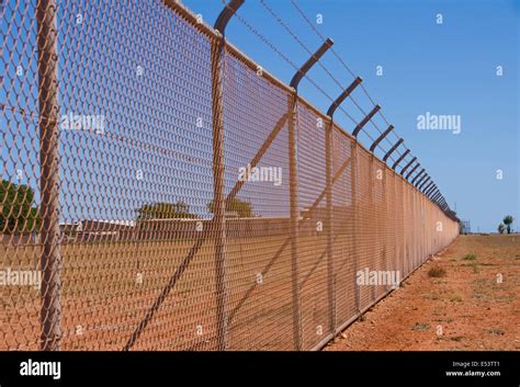 Nasty Fence At The Naval Base In Exmouth Australia Stock Photo Alamy