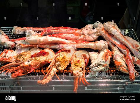 Grilled Shrimp And Crabs At Kuromon Ichiba Market Osaka Japan Stock