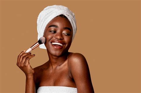 Portrait Of Beautiful Black Woman With Makeup Brush Makeup For Black