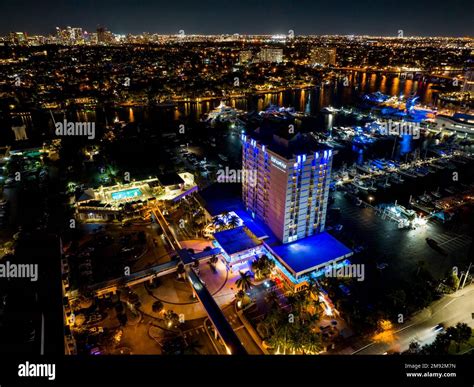 Fort Lauderdale, FL, USA - January 14, 2023: Night aerial photo Bahia Mar Resort and marina Fort ...