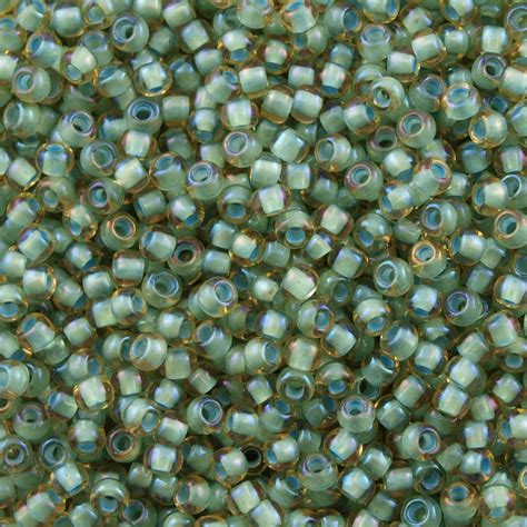 Toho Seed Bead 110 Inside Color Lined Sea Foam Topaz 952 Aura Crystals Llc