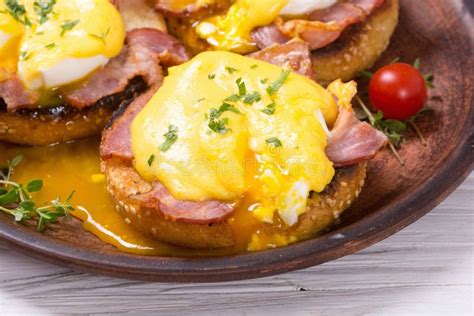 Eggs benedict with bacon stock photo. Image of brunch - 97224550