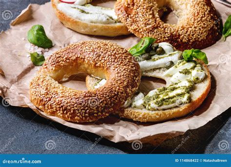 Bagels with cream cheese stock photo. Image of green - 114868422