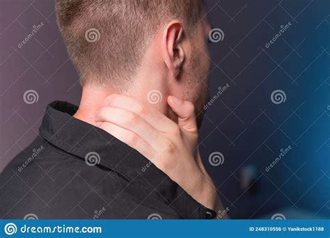 Close-up of a Man Independently Kneading His Neck and Neck Muscles Long ...