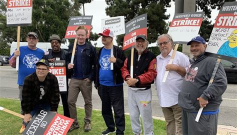 'The Simpsons' team hits picket line in solidarity with writers