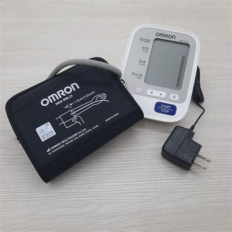 Tensiometro Omron Elite Con Adaptador De Electricidad Janomedical