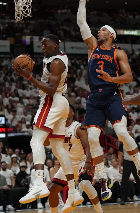 Miami Heat Center Bam Adebayo Grabs A Rebound Over New York Knicks