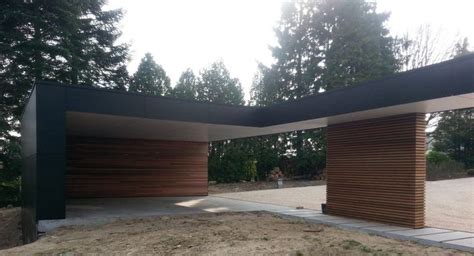 Two Garages With Wooden Slats On The Roof And Doors Open In Front Of Them