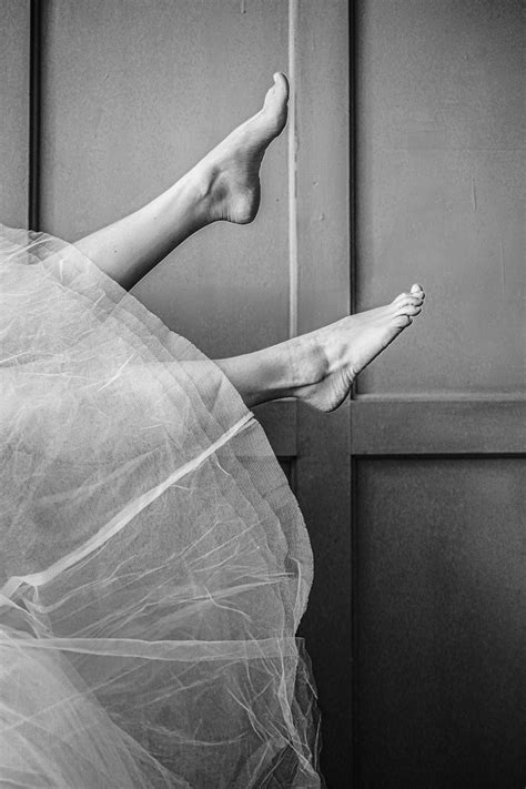 Grayscale Photo Of Persons Feet On Glass Photo Free Grey Image On Unsplash