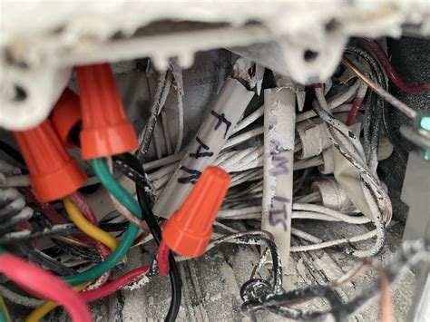 Install Leviton smart dimmer switches with neutral wires shoved in the