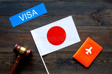 Visa To Japan Concept Japanese Flag Near Passport And Judge Hammer On White Background Top Down