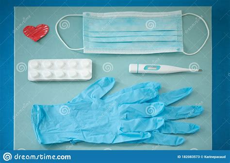 Top View Composition Of Blue Surgical Mask And Gloves A Digital