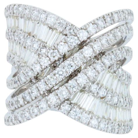 Diamond Halo Pave Baguette Spiral Wave Cocktail Band 18 Karat White Gold Ring For Sale At 1stdibs