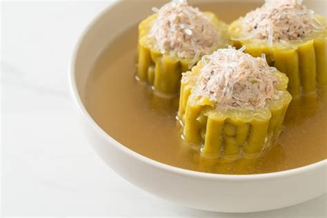 Premium Photo Stuffed Bitter Gourd With Seasoned Minced Pork Soup