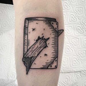 Hand holding knife tattoo - Tattoogrid.net