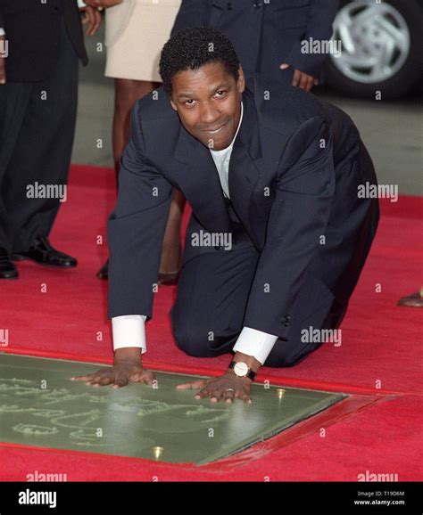 Denzel washington footprint ceremony hi-res stock photography and ...