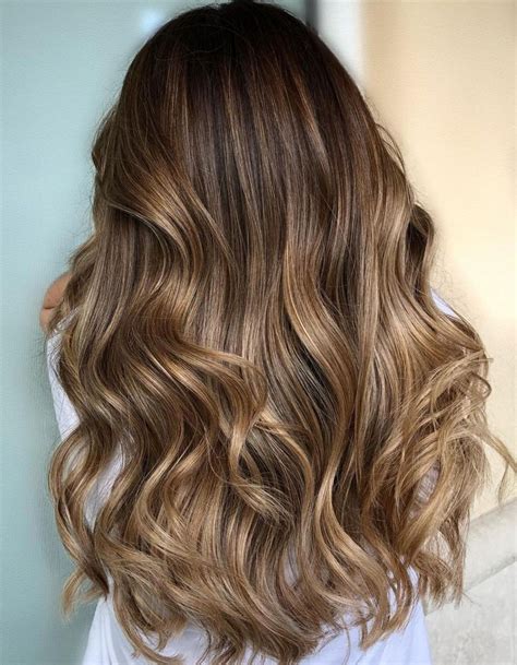 How To Choose The Perfect Shade Of Caramel Lowlights To Complement Your Natural Hair Tone 13