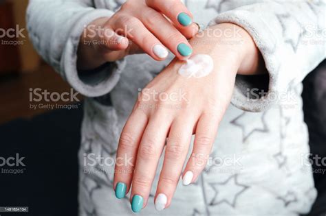 Hand Skin Care Cosmetology Concept Woman Applying Hand Cream After