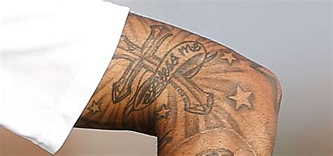 Admire the 37 tattoos of Dani Alves & their meanings